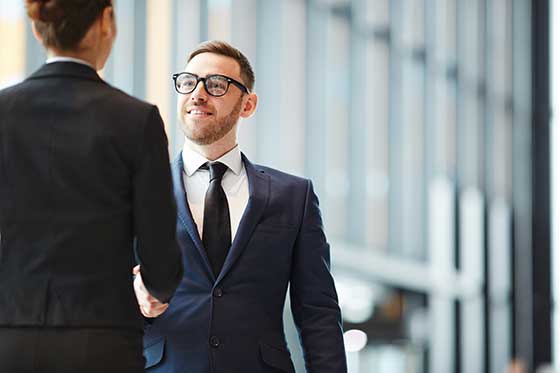 Businessman Greeting Colleague